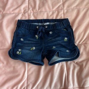 Girls blue shorts with daisies